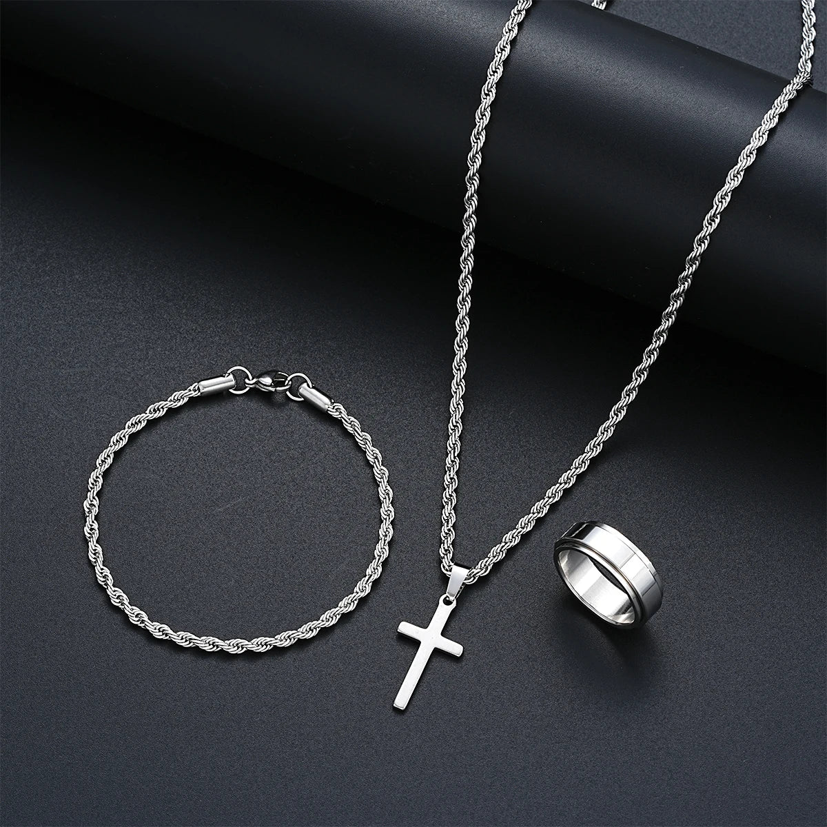 Stainless Steel Simple  3 piece Jewelry Set For Men /Women.  Fashion Silver Color,  Cross Pendant,  Twisted Rope Necklace and Bracelets with Ring Gift.