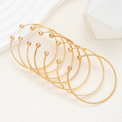7 Pcs/Set,  Gold Color Bracelets for Women .  Streetwear, Heart Prints Metal Design Open Bangle Fashion Jewelry Gifts