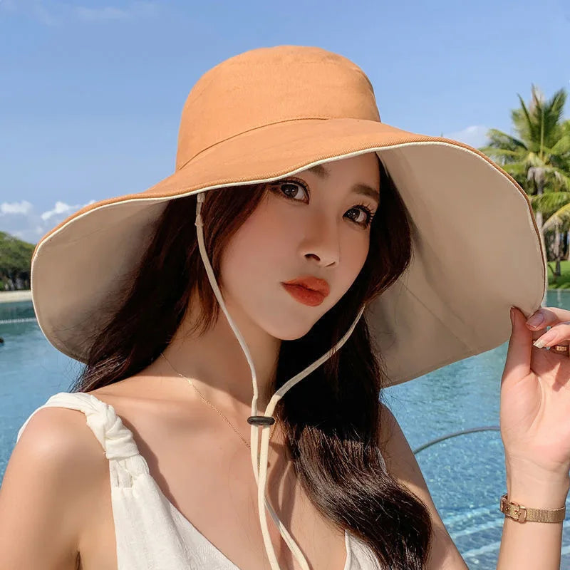 Wide Brim UPF 50+ Sun Hat  for Women.  Anti-UV Protection for any outdoor activity. Folding Summer Beach Hat.  Double Sided.   There a few left in BLACK or KAHKI.