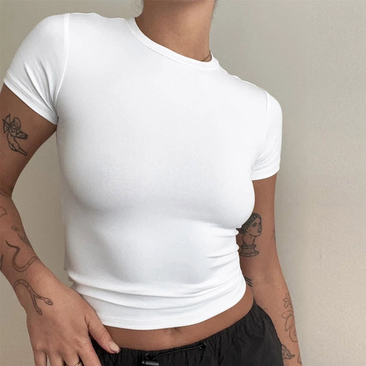 Womens tight fitting, sporty TEE Shirt in several solid colors.