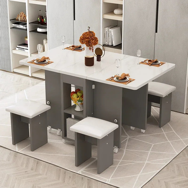 The household folding dining table is mobile and extensive and the is multi-functional
