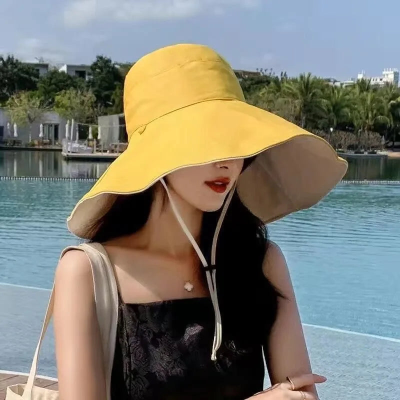 Wide Brim UPF 50+ Sun Hat  for Women.  Anti-UV Protection for any outdoor activity. Folding Summer Beach Hat.  Double Sided.   There a few left in BLACK or KAHKI.