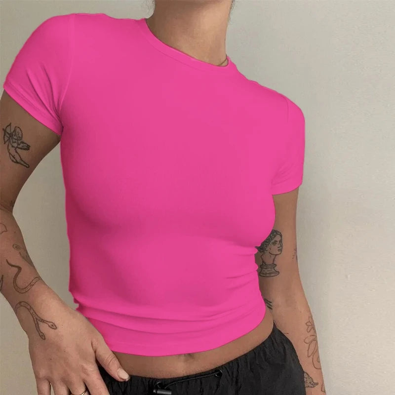 Womens tight fitting, sporty TEE Shirt in several solid colors.