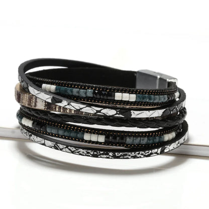 ZG Multilayer Brown Leather Bracelet For Women/Men  Fashion Creative Bohemian Hand Woven Magnetic Clasp Bracelet.  BLACK and BLUE are Available.  Measurement is 19.8 cm so that is 7.8 inches.