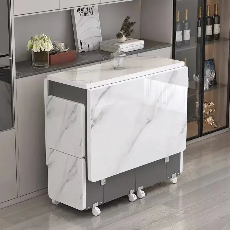 The household folding dining table is mobile and extensive and the is multi-functional
