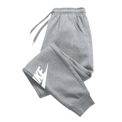 Men's printed pants for autumn and winter. Men's and women's running pants, sportswear and casual pants, fitness and gym sportswear