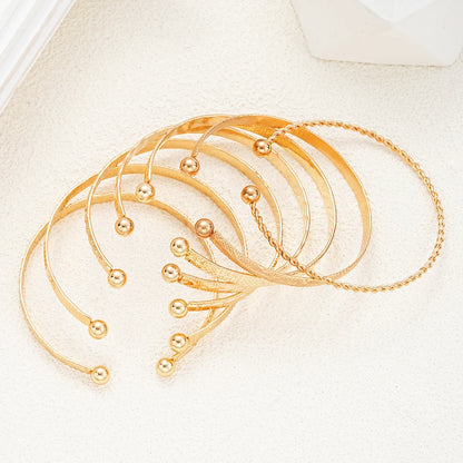 7 Pcs/Set,  Gold Color Bracelets for Women .  Streetwear, Heart Prints Metal Design Open Bangle Fashion Jewelry Gifts