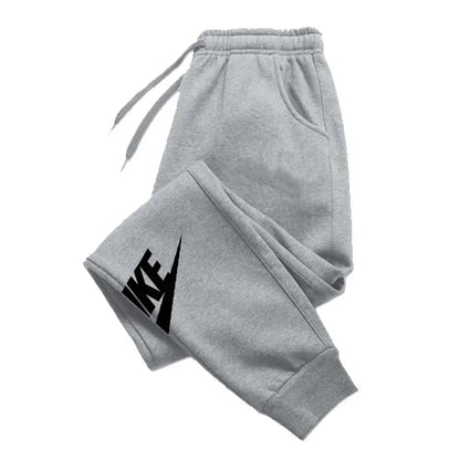 Men's printed pants for autumn and winter. Men's and women's running pants, sportswear and casual pants, fitness and gym sportswear